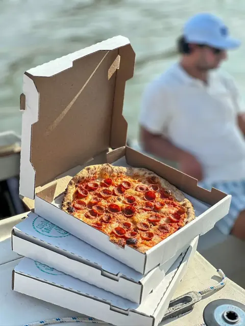 Pizza to go on a boat on Lake Erie