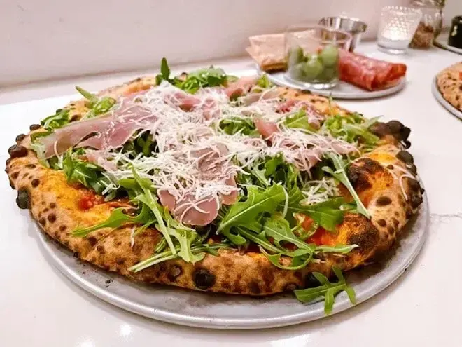 Nights & Weekends pizza featured in Cleveland Scene